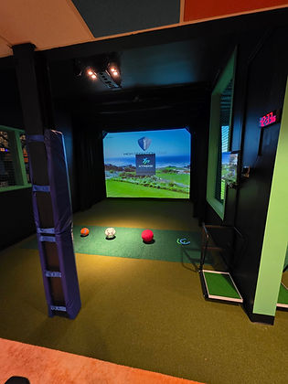sports simulator at extreme playing showing the golf simulation
